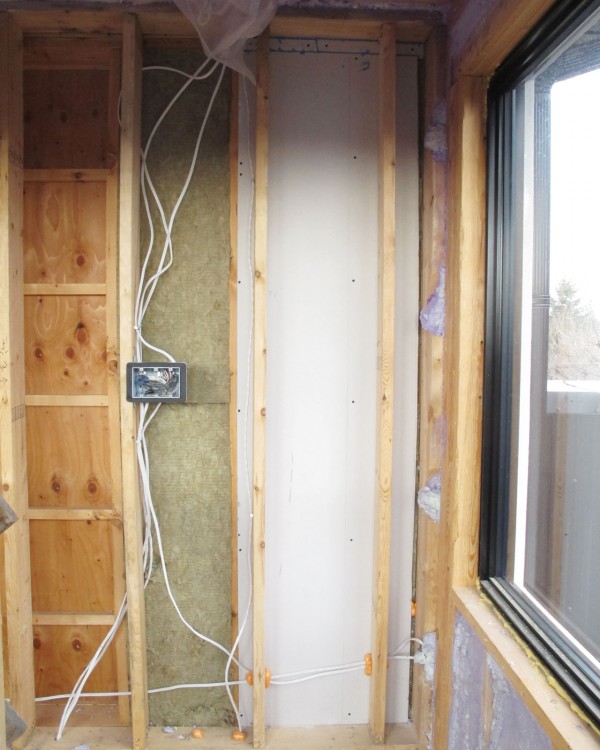 Fire rated wall assembly